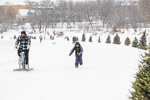 MIKAELA MACKENZIE / WINNIPEG FREE PRESS

Roldan Uminga and his daughter, Rianne (nine), ice bike and skate on the River Trail as the weather takes a turn for the warmer and snow falls lightly after a cold snap in Winnipeg on Saturday, Feb. 4, 2023. Standup.

Winnipeg Free Press 2023.