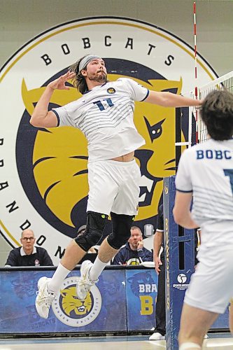 Brandon Bobcats middle blocker Bryston Keck attacks against the Saskatchewan Huskies in their Canada West men's volleyball match at the Healthy Living Centre on Saturday. (Thomas Friesen/The Brandon Sun)