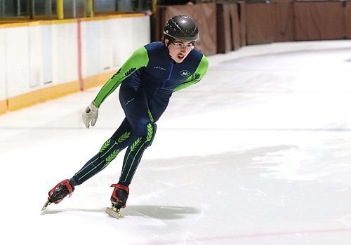 Adrian Lanoie of the Westman Speed Skating Club powers around a corner during a recent training session at the Sportsplex. (Perry Bergson/The Brandon Sun)