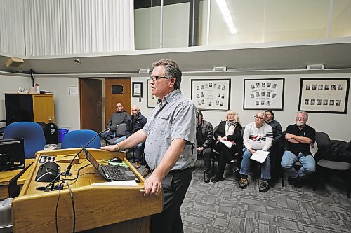 Brandon's director of engineering Mark Allard talks about the received proposals for the demolition and reconstruction of the Park Community Centre as proponents of the centre watch in council chamber Monday evening. (Colin Slark/The Brandon Sun)