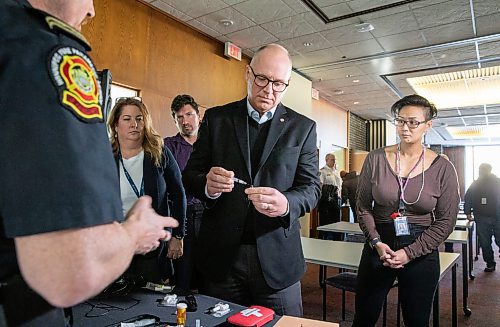 JESSICA LEE / WINNIPEG FREE PRESS
Cory Guest, Education Coordinator with Winnipeg Paramedic Service, teaches members of City Council, including Mayor Scott Gillingham, on how to administer naloxone at City Hall on January 30, 2023.
Reporter: Malak Abas