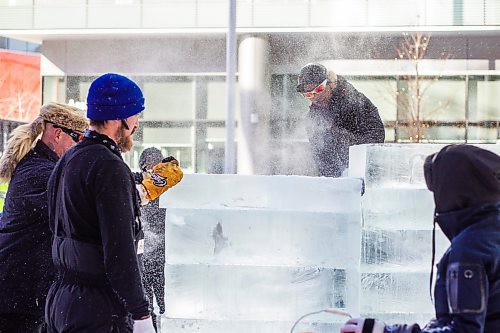 MIKAELA MACKENZIE / WINNIPEG FREE PRESS

Victor Dagatan cuts an ice block to fit on the stack in preparation for ice carving at True North Square in Winnipeg on Tuesday, Feb. 7, 2023. For &#x460;story.

Winnipeg Free Press 2023.