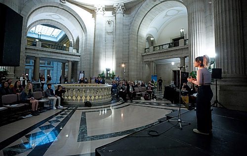MIKE DEAL / WINNIPEG FREE PRESS
Aylin Kohan a student at Fort Richmond Collegiate who was born in Iran, performs her spoken word poem &quot;Someday&quot; in the Rotunda at the Manitoba Legislative building Tuesday morning. 
The poem reflects on her former homeland of Iran and current home of Winnipeg, and explores themes of identity and human rights. 
The performance at the Manitoba Legislative building kicks off International Development Week in Manitoba and was hosted by the Manitoba Council for International Cooperation (MCIC). International Development Week celebrates the contributions Manitobans make around the world. 
230207 - Tuesday, February 07, 2023.