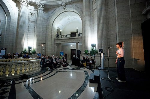 MIKE DEAL / WINNIPEG FREE PRESS
Aylin Kohan a student at Fort Richmond Collegiate who was born in Iran, performs her spoken word poem &quot;Someday&quot; in the Rotunda at the Manitoba Legislative building Tuesday morning. 
The poem reflects on her former homeland of Iran and current home of Winnipeg, and explores themes of identity and human rights. 
The performance at the Manitoba Legislative building kicks off International Development Week in Manitoba and was hosted by the Manitoba Council for International Cooperation (MCIC). International Development Week celebrates the contributions Manitobans make around the world. 
230207 - Tuesday, February 07, 2023.