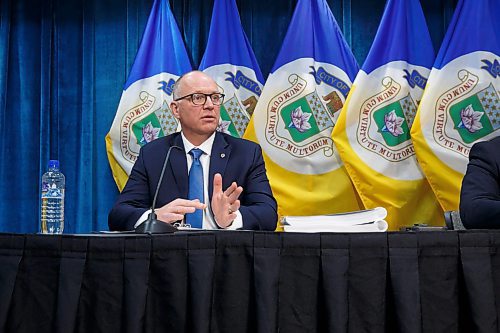 MIKE DEAL / WINNIPEG FREE PRESS
Mayor Scott Gillingham (left) and Finance Chairperson Jeff Browaty answer questions from the media just before the City of Winnipeg Preliminary 2023 Budget is tabled at City Hall Wednesday afternoon.
230208 - Wednesday, February 08, 2023.