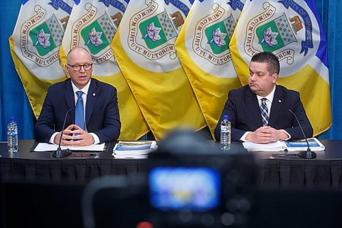 MIKE DEAL / WINNIPEG FREE PRESS
Mayor Scott Gillingham (left) and Finance Chairperson Jeff Browaty answer questions from the media just before the City of Winnipeg Preliminary 2023 Budget is tabled at City Hall Wednesday afternoon.
230208 - Wednesday, February 08, 2023.