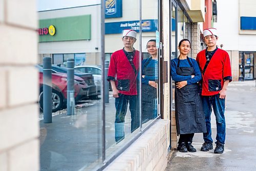 MIKAELA MACKENZIE / WINNIPEG FREE PRESS

Momo Japanese and Korean Restaurant co-owners Lisa Le and Sunpil Han pose for a photo in front of their business, which was recently broken into, in Winnipeg on Wednesday, Feb. 8, 2023. For Erik story.

Winnipeg Free Press 2023.