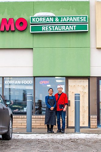 MIKAELA MACKENZIE / WINNIPEG FREE PRESS

Momo Japanese and Korean Restaurant co-owners Lisa Le and Sunpil Han pose for a photo in front of their business, which was recently broken into, in Winnipeg on Wednesday, Feb. 8, 2023. For Erik story.

Winnipeg Free Press 2023.