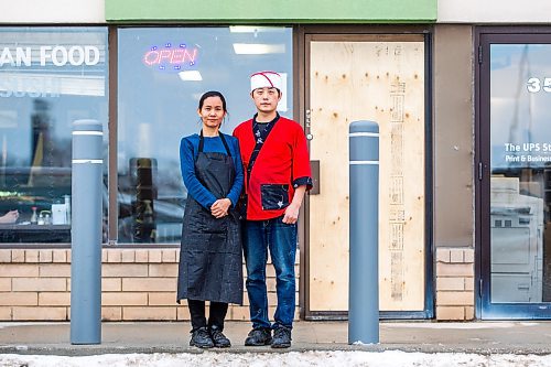 MIKAELA MACKENZIE / WINNIPEG FREE PRESS

Momo Japanese and Korean Restaurant co-owners Lisa Le and Sunpil Han pose for a photo in front of their business, which was recently broken into, in Winnipeg on Wednesday, Feb. 8, 2023. For Erik story.

Winnipeg Free Press 2023.