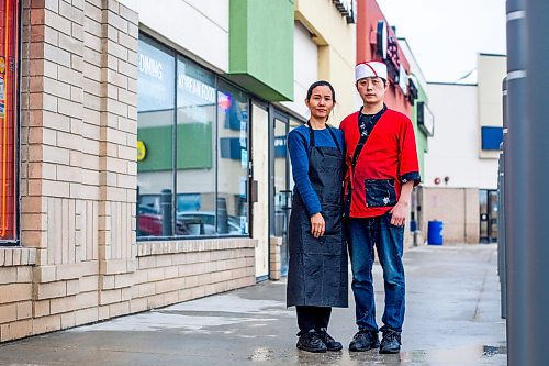 MIKAELA MACKENZIE / WINNIPEG FREE PRESS

Momo Japanese and Korean Restaurant co-owners Lisa Le and Sunpil Han pose for a photo in front of their business, which was recently broken into, in Winnipeg on Wednesday, Feb. 8, 2023. For Erik story.

Winnipeg Free Press 2023.