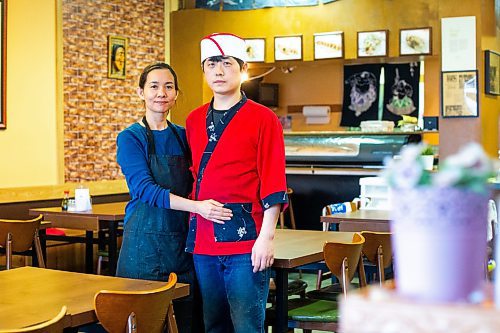 MIKAELA MACKENZIE / WINNIPEG FREE PRESS

Momo Japanese and Korean Restaurant co-owners Lisa Le and Sunpil Han pose for a photo in front of their business, which was recently broken into, in Winnipeg on Wednesday, Feb. 8, 2023. For Erik story.

Winnipeg Free Press 2023.