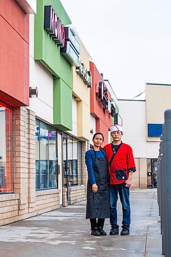 MIKAELA MACKENZIE / WINNIPEG FREE PRESS

Momo Japanese and Korean Restaurant co-owners Lisa Le and Sunpil Han pose for a photo in front of their business, which was recently broken into, in Winnipeg on Wednesday, Feb. 8, 2023. For Erik story.

Winnipeg Free Press 2023.