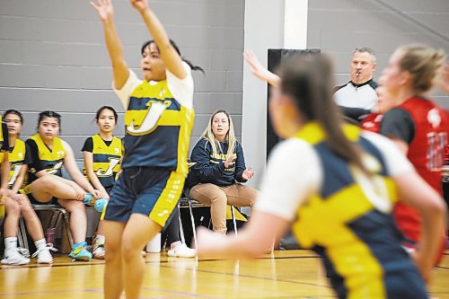 DARCY FINLEY / WINNIPEG FREE PRESS St. James Collegiate varsity girls basketball coach Ashley van Aggelen looks on during a game at La Salle Rec Centre - Friday, February 03, 2023.