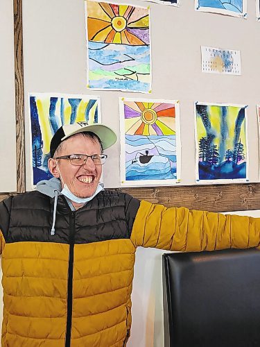 Stanley Szwagierczak was extremely proud of his paintings, both of which were on display at Brews Brothers Bistro in Neepawa earlier this month. (Miranda Leybourne/The Brandon Sun)