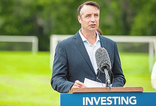 ETHAN CAIRNS / WINNIPEG FREE PRESS
Sport, Culture and Heritage Minister Andrew Smith speaks in the soccer field at the Bourkevale Community Centre for an announcement about a new grant program for Arts, Culture, and Sports programming in Winnipeg on Monday, July 25, 2022  