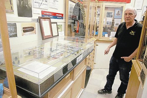 Museum researcher Ted Krasicki stands beside a model of the A4 Canadian Artillery Training Centre that covered 12 city blocks in south Brandon during the Second World War. There is no admission charge to visit the museum that is housed in the Brandon Armoury at the corner of 11th Street and Victoria Avenue. (Ian Hitchen/Brandon Sun)