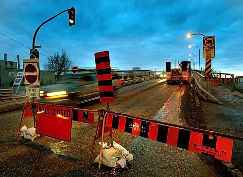 PHIL HOSSACK / WINNIPEG FREE PRESS 030108 South boun lanes of the Arlington Street bridge were closed Wednesday afternoon after a hole opened in the roadway.....
