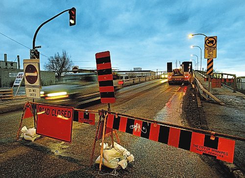 PHIL HOSSACK / WINNIPEG FREE PRESS 030108 South boun lanes of the Arlington Street bridge were closed Wednesday afternoon after a hole opened in the roadway.....