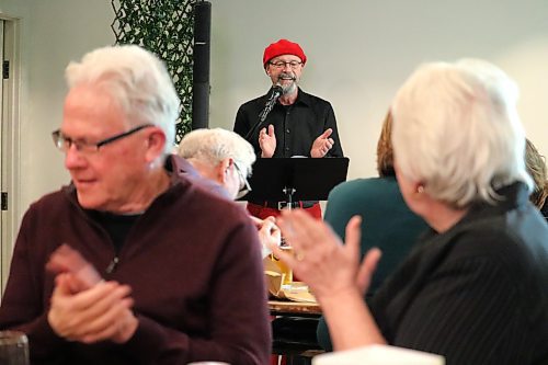 The Green Spot owner Bernie Whetter leads the patrons of Section 6 Brewing Co. through a rendition of "Fly Me to the Moon" during Friday night's Brandon Beer Choir event in the downtown area. (Kyle Darbyson/The Brandon Sun)