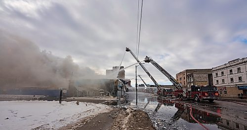 DAVID LIPNOWSKI / WINNIPEG FREE PRESS

Three businesses were destroyed after a fire broke out in the 800 block of Main Street, Saturday February 11, 2023.
