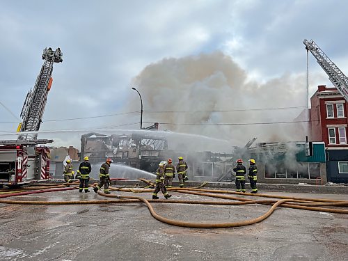 David Lipnowski / Winnipeg Free Press
Three businesses are destroyed after a fire broke out the 800 block of Main Street Saturday.