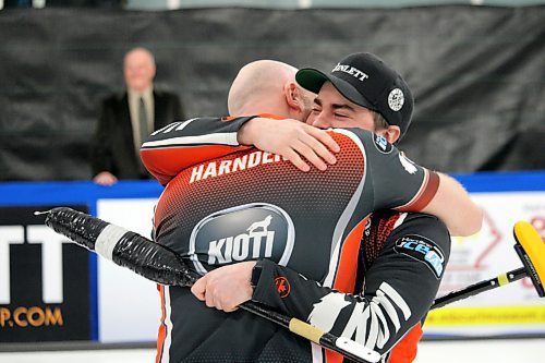 Ryan Harnden, left, embraces Matt Dunstone after they won the 2023 Viterra Championship on Sunday in Neepawa. (Lucas Punkari/The Brandon Sun)