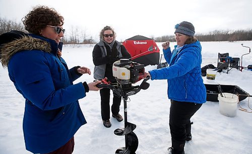 JOHN WOODS / WINNIPEG FREE PRESS
Dana and Sherry Urbanski, sisters, from left, and Roselle Turenne, owner of Prairie Gal Fishing, drill holes with an auger during a fishing workshop on a lake at Fort Whyte Sunday, February 12, 2023. Turenne runs fishing workshops for women where she teaches women the ins and outs of ice-fishing.

Re: Sanderson