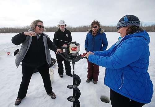 JOHN WOODS / WINNIPEG FREE PRESS
Sherry Urbanski, from left, Sean Scott, volunteer, Dana Urbanski, and Roselle Turenne, owner of Prairie Gal Fishing, drill holes with an auger during a fishing workshop on a lake at Fort Whyte Sunday, February 12, 2023. Turenne runs fishing workshops for women where she teaches women the ins and outs of ice-fishing.

Re: Sanderson