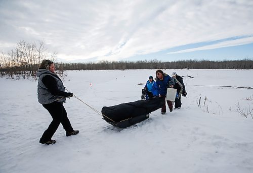 JOHN WOODS / WINNIPEG FREE PRESS
Sherry Urbanski, from left, Roselle Turenne, owner of Prairie Gal Fishing, Dana Urbanski and Sean Scott, volunteer, leave their fishing hole after a workshop on a lake at Fort Whyte Sunday, February 12, 2023. Turenne runs fishing workshops for women where she teaches women the ins and outs of ice-fishing.

Re: Sanderson