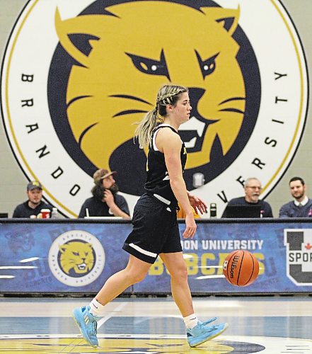 Chelsea Misskey played her final Brandon University Bobcats women's basketball game on Saturday. Her teammates copied her double-braid hairstyle for the game. (Thomas Friesen/The Brandon Sun)