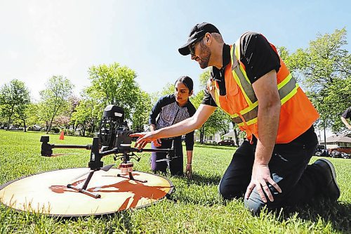 RUTH BONNEVILLE / WINNIPEG FREE PRESS



LOCAL - Dutch Elm drones



Samm Mohan of Maples MET School learns about the different parts of a drone from   Matthew Johnson, Education director of Volatus Aerospace Thursday. 





DRONE SCHOOL: Volatus Aerospace Corp., a so-called "drone solution company," has partnered with the City of Winnipeg, UWinnipeg and Seven Oaks School Division on a new project that aims to streamline the process of identifying Dutch elm disease and teach students about drones and how to fly them.  



Photos of Representatives from Volatus Aerospace Corp.,and students from the Seven Oaks School Division as they learn about drones and and begin to survey all the trees at Kildonan Park to examine their health specifically Dutch Elm disease Thursday.  



Reporter  Maggie 



 June 9th, 2022