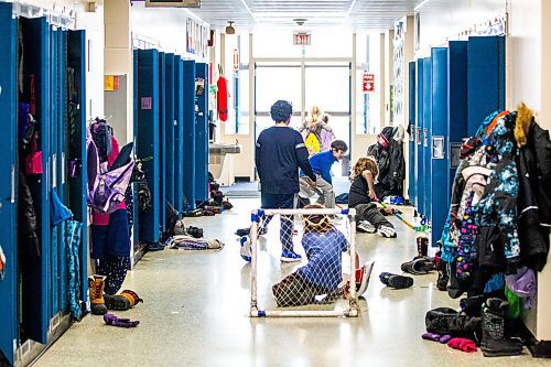 MIKAELA MACKENZIE / WINNIPEG FREE PRESS

A ball hockey game takes place in the hallway during a day of unstructured play at cole Dieppe in Winnipeg on Tuesday, Feb. 14, 2023. For Maggie story.

Winnipeg Free Press 2023.