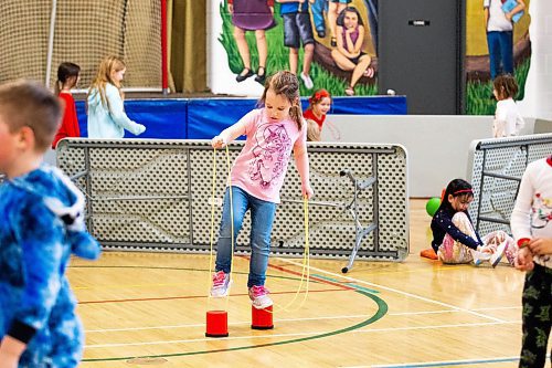 MIKAELA MACKENZIE / WINNIPEG FREE PRESS

Grade one student Aria Szczerski tries out stilts in the gym during a day of unstructured play at cole Dieppe in Winnipeg on Tuesday, Feb. 14, 2023. For Maggie story.

Winnipeg Free Press 2023.