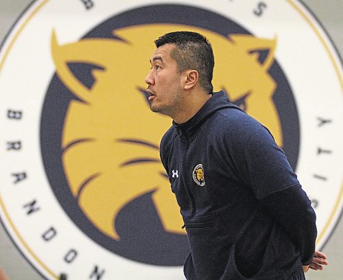 Bobcats men's basketball coach Gil Cheung watches his team practise ahead of Friday's playoff game against Fraser Valley in Winnipeg. (Thomas Friesen/The Brandon Sun)