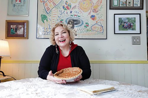 RUTH BONNEVILLE / WINNIPEG FREE PRESS 

ENT - sugar pie

Portrait of Paulette Duguay with her traditional sugar pie, in her home in St. Boniface.  Also photos of pie only and with her handwritten recipe. 

Subject: Paulette is the president of the Union nationale mtisse Saint-Joseph du Manitoba. She&#x573; sharing her sugar pie recipe for an upcoming Homemade feature running ahead of Festival du Voyageur.

Eva Wasney

Feb 8th,  2023