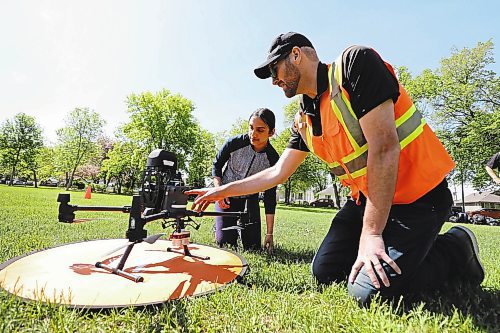 RUTH BONNEVILLE / WINNIPEG FREE PRESS

LOCAL - Dutch Elm drones

Samm Mohan of Maples MET School learns about the different parts of a drone from   Matthew Johnson, Education director of Volatus Aerospace Thursday. 


DRONE SCHOOL: Volatus Aerospace Corp., a so-called &quot;drone solution company,&quot; has partnered with the City of Winnipeg, UWinnipeg and Seven Oaks School Division on a new project that aims to streamline the process of identifying Dutch elm disease and teach students about drones and how to fly them.  

Photos of Representatives from Volatus Aerospace Corp.,and students from the Seven Oaks School Division as they learn about drones and and begin to survey all the trees at Kildonan Park to examine their health specifically Dutch Elm disease Thursday.  

Reporter  Maggie 

 June 9th, 2022