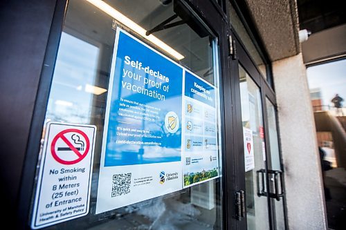 MIKAELA MACKENZIE / WINNIPEG FREE PRESS

Signs indicate masking and vaccination protocols on the doors of the University Centre at the University of Manitoba in Winnipeg on Monday, Feb. 28, 2022. For Maggie Macintosh story.
Winnipeg Free Press 2022.