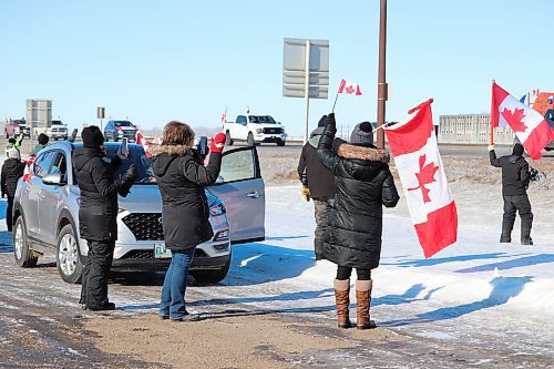 Westman residents greet members of the World Unity Convoy as they drive into the Husky gas station off of Highway 1 in Brandon Thursday morning. (Kyle Darbyson/The Brandon Sun) 