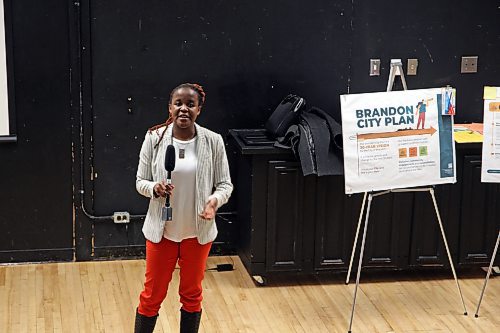 Community planner Sonikile Tembo talks about the development of a new city plan for Brandon at a joint Ward 3/4 meeting Thursday evening at Vincent Massey High School. (Colin Slark/The Brandon Sun)