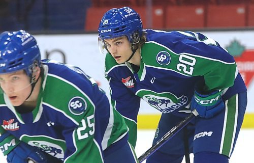 Swift Current Broncos forward Braeden Lewis (20) of Virden, right, lines up for a faceoff with Clarke Caswell of Brandon (25) in the foreground his team&#x2019;s Western Hockey League game against the Brandon Wheat Kings at Westoba Place last Tuesday. (Perry Bergson/The Brandon Sun)