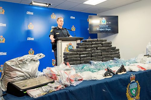 Mike Sudoma/Winnipeg Free Press
Contable Jay Murray, talks to media Friday afternoon about the Project Onyx bust which resulted in the seizure of large quantities of cocaine, methamphetamine, MDMA, firearms, and approximately five hundred thousand dollars in cash.
February 16, 2023 