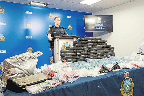 Mike Sudoma/Winnipeg Free Press
Contable Jay Murray, talks to media Friday afternoon about the Project Onyx bust which resulted in the seizure of large quantities of cocaine, methamphetamine, MDMA, firearms, and approximately five hundred thousand dollars in cash.
February 16, 2023 