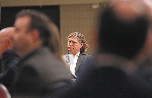 Brandon Mayor Jeff Fawcett listens to a presentation on the future of tourism in Manitoba by Travel Manitoba president and CEO Colin Ferguson during a Brandon Chamber of Commerce luncheon at the Keystone Centre's MNB Hall on Thursday afternoon. (Matt Goerzen/The Brandon Sun)