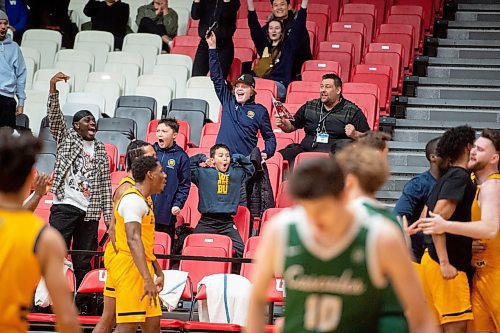 Mike Sudoma/Winnipeg Free Press
Brandon University Bobcats cheer in the stands after a successful three point shoot during their game against the University of Fraser Valley Cascades at the University of Winnipeg&#x2019;s Duckworth Centre Friday afternoon
February 17, 2023 