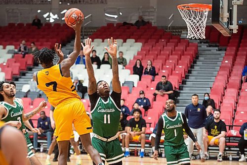 Mike Sudoma/Winnipeg Free Press
Cascades Guard, Chris Jackson attempts to block Brandon University Bobcats Anthony Tsegakeles shot during their game at the University of Winnipeg&#x2019;s Duckworth Centre Friday afternoon
February 17, 2023 