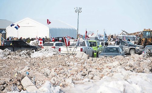 Mike Sudoma/Winnipeg Free Press
Flags fly atop cars parked inside Camp Hope Saturday
February 18, 2023 
