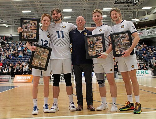 Coach Grant Wilson, centre, and the Brandon University Bobcats recognized men's volleyball seniors Rylan Metcalf, from left, Bryston Keck, Max Brook and Nigel Tolley at their final Canada West match of the regular season on Saturday. (Thomas Friesen/The Brandon Sun)