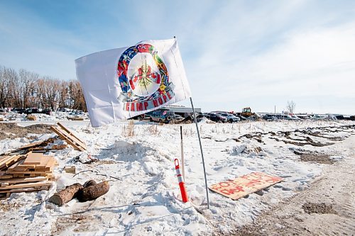 Mike Sudoma/Winnipeg Free Press
A Camp Hope flags flies at the camp&#x2019;s entrance Saturday
February 17, 2023 