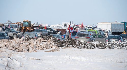 Mike Sudoma/Winnipeg Free Press
Flags fly atop cars parked inside Camp Hope Saturday
February 18, 2023 