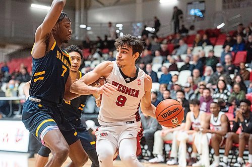 Mike Sudoma/Winnipeg Free Press
Winnipeg Wesmen guard Alberto Gordo looks for a pass while his team takes on the Brandon University Bobcats at the Duckworth centre Saturday
February 17, 2023 